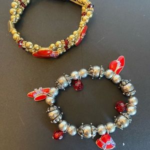 Red Hat Society stretch bracelets one gold, one silver with red hat charms